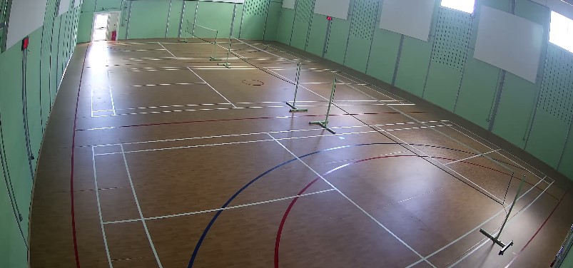 sports hall with badminton nets set up